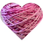 a heart-filled image of soft lavender and petal-blush yarn, gently variegated with airy color. 